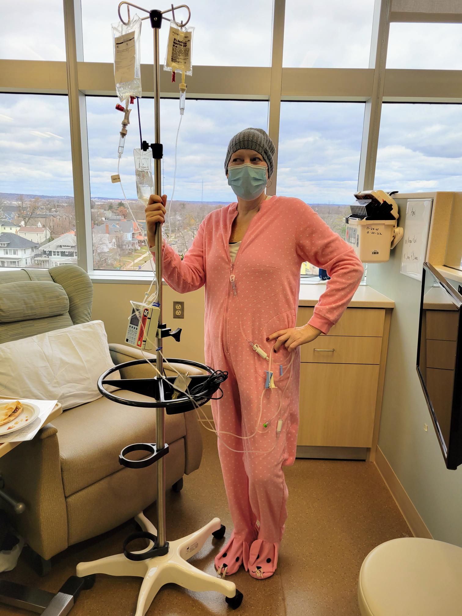 Amy Ritsema, co-owner of OnSite Wellness, takes a photo during chemotherapy