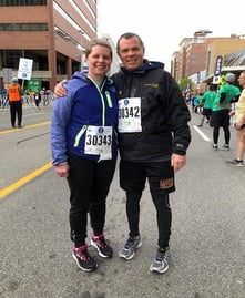 Roy Zuidema, client services manager, with his wife, finishing a race